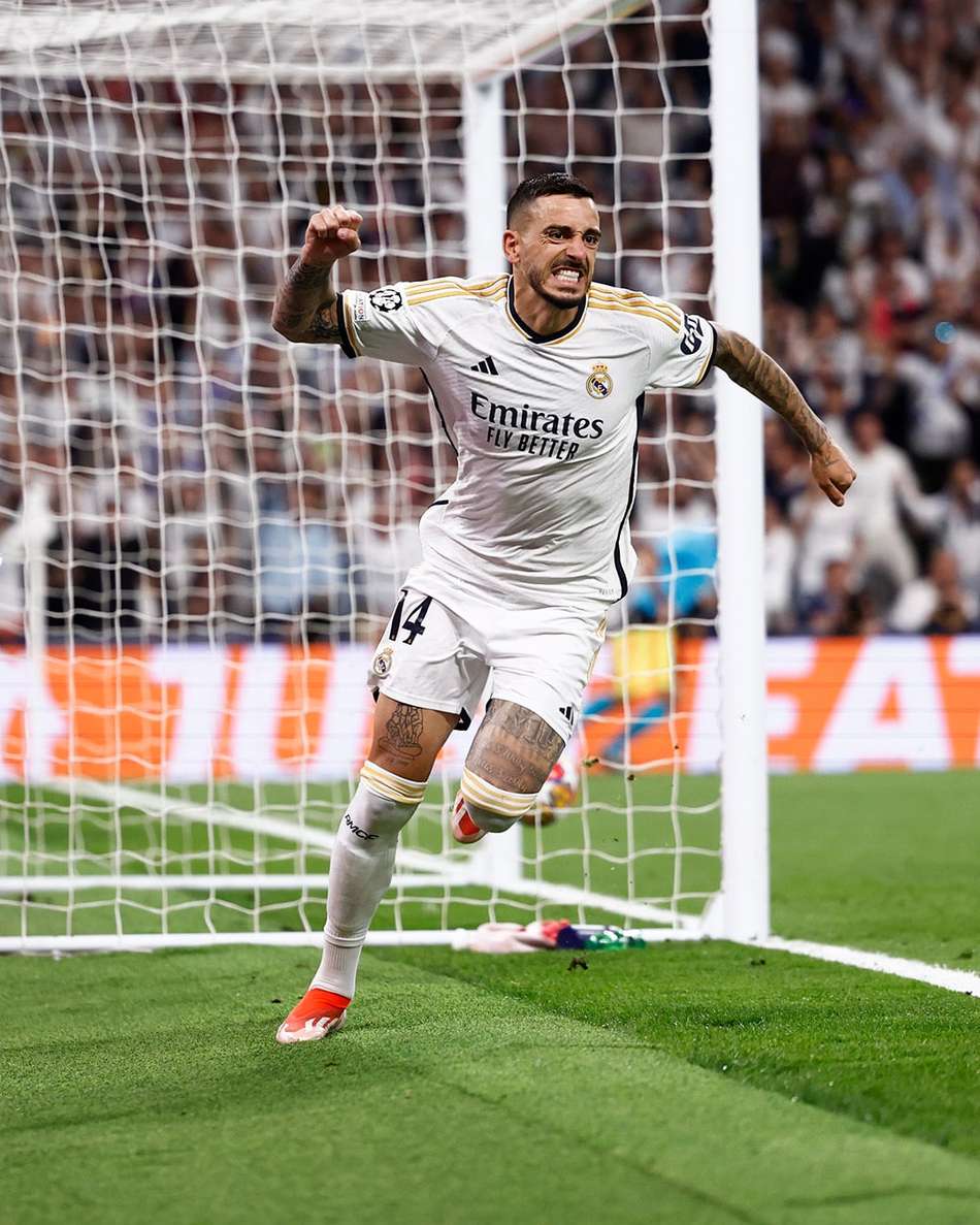 Joselu comemorando gol pelo Real Madrid na Champions League