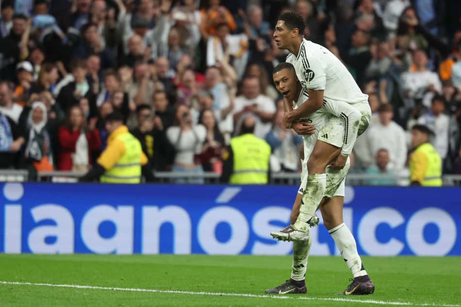Mbappé e Bellingham comemoram gol do Real contra o Celta (Foto: Pierre-Philippe MARCOU / AFP)