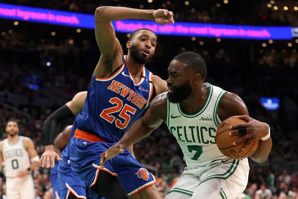 BOSTON, MASSACHUSETTS - MAY 05: Jaylen Brown #7 of the Boston Celtics drives the ball against Mikal Bridges #25 of the New York Knicks during the fourth quarter in Game One of the Eastern Conference Second Round NBA Playoffs at TD Garden on May 05, 2025 in Boston, Massachusetts. NOTE TO USER: User expressly acknowledges and agrees that, by downloading and or using this photograph, User is consenting to the terms and conditions of the Getty Images License Agreement. Maddie Meyer/Getty Images/AFP (Photo by Maddie Meyer / GETTY IMAGES NORTH AMERICA / Getty Images via AFP)