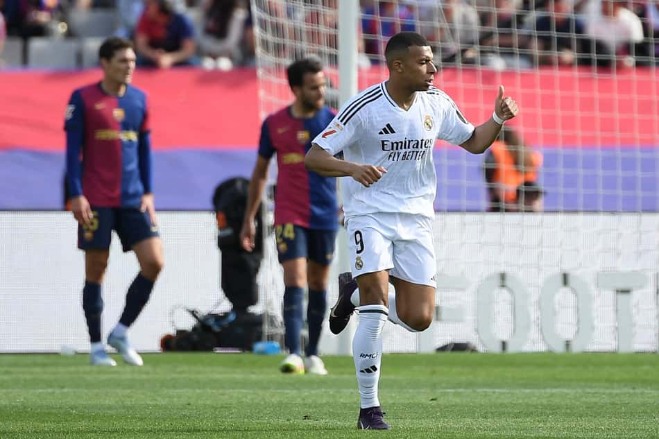 Jogos de hoje: Real Madrid e Barcelona se enfrentam pelo Campeonato Espanhol (Foto: Josep LAGO / AFP)