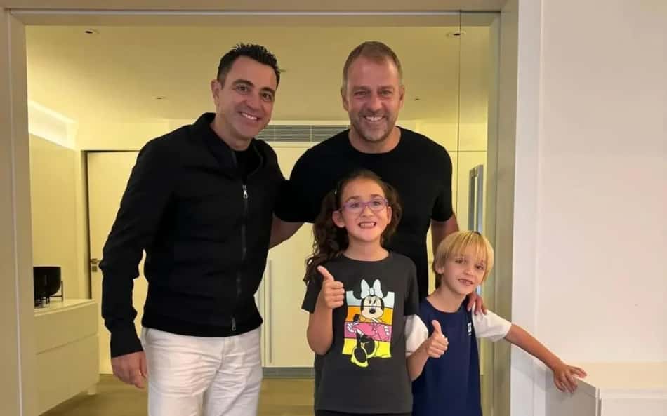 Xavi e Hansi Flick se encontrando