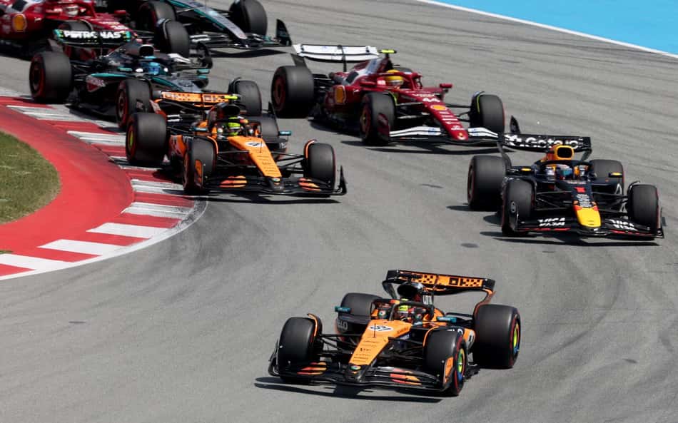 McLaren's Australian driver Oscar Piastri leads the race at the start of the Spanish Formula One Grand Prix at the Circuit de Catalunya in Montmelo, on the outskirts of Barcelona, on June 1, 2025. (Photo by Pierre-Philippe MARCOU / AFP)