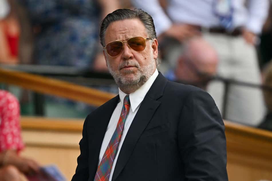 O ator e diretor neozelandês Russell Crowe em um dos camarotes em Wimbledon (Fto: Glyn KIRK / AFP)