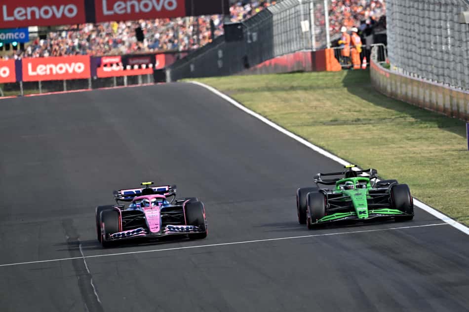 Kick Sauber's Brazilian driver Gabriel Bortoleto and Alpine's Argentinian driver Franco Colapinto drive during the second practice session at the Hungaroring race track near Budapest, Hungary, on August 1, 2025, ahead of the Formula One Hungarian Grand Prix. (Photo by ATTILA KISBENEDEK / AFP)