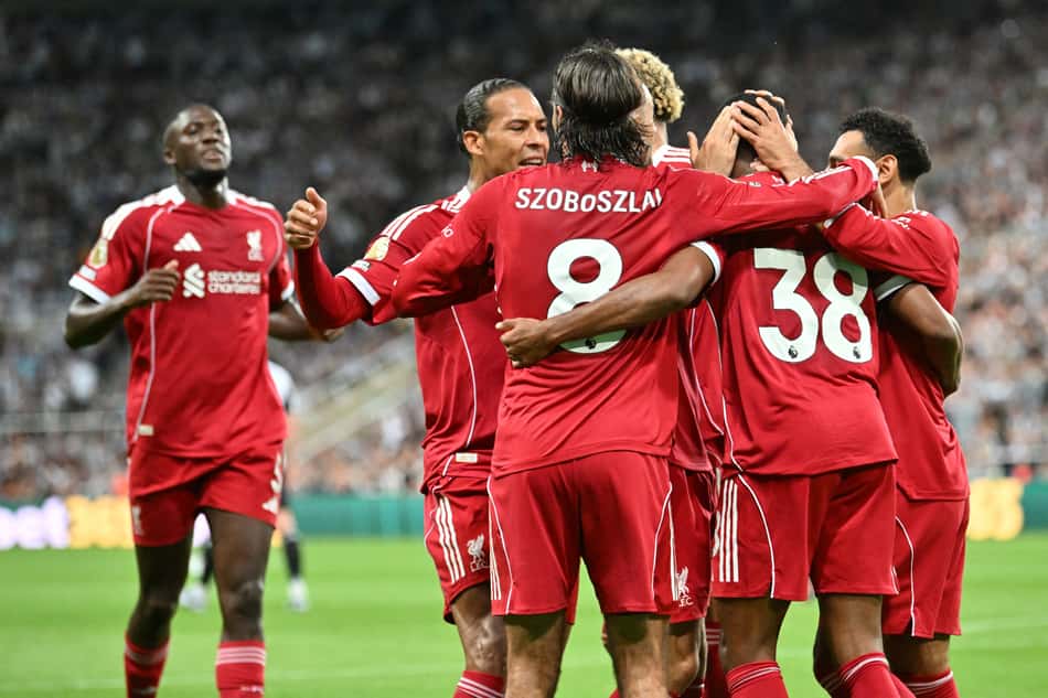 Liverpool's Dutch midfielder #38 Ryan Gravenberch (2R) celebrates with teammates after scoring the opening goal of the English Premier League football match between Newcastle United and Liverpool at St James' Park in Newcastle-upon-Tyne, north east England on August 25, 2025. (Photo by ANDY BUCHANAN / AFP) / RESTRICTED TO EDITORIAL USE. NO USE WITH UNAUTHORIZED AUDIO, VIDEO, DATA, FIXTURE LISTS, CLUB/LEAGUE LOGOS OR 'LIVE' SERVICES. ONLINE IN-MATCH USE LIMITED TO 120 IMAGES. AN ADDITIONAL 40 IMAGES MAY BE USED IN EXTRA TIME. NO VIDEO EMULATION. SOCIAL MEDIA IN-MATCH USE LIMITED TO 120 IMAGES. AN ADDITIONAL 40 IMAGES MAY BE USED IN EXTRA TIME. NO USE IN BETTING PUBLICATIONS, GAMES OR SINGLE CLUB/LEAGUE/PLAYER PUBLICATIONS. /