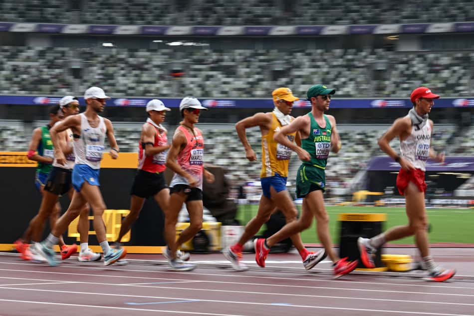 Athletes compete in the men's 35km race walk final during the World Athletics Championships in Tokyo on September 13, 2025. (Photo by Yuichi YAMAZAKI / AFP)