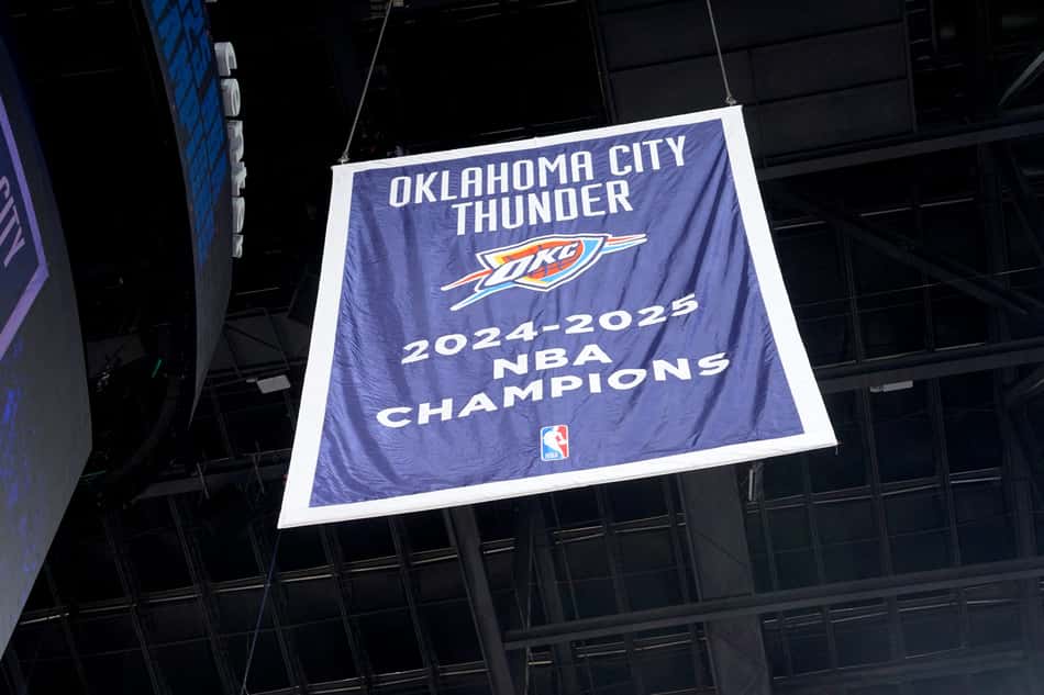 OKLAHOMA CITY, OK - OCTOBER 21: The Oklahoma City Thunder 2024-2025 NBA Championship banner is raised before the game against the Houston Rockets on October 21, 2025 at Paycom Center in Oklahoma City, Oklahoma. NOTE TO USER: User expressly acknowledges and agrees that, by downloading and or using this photograph, User is consenting to the terms and conditions of the Getty Images License Agreement. Mandatory Copyright Notice: Copyright 2025 NBAE Jesse D. Garrabrant /NBAE via Getty Images/AFP (Photo by Jesse D. Garrabrant / NBAE / Getty Images / Getty Images via AFP)