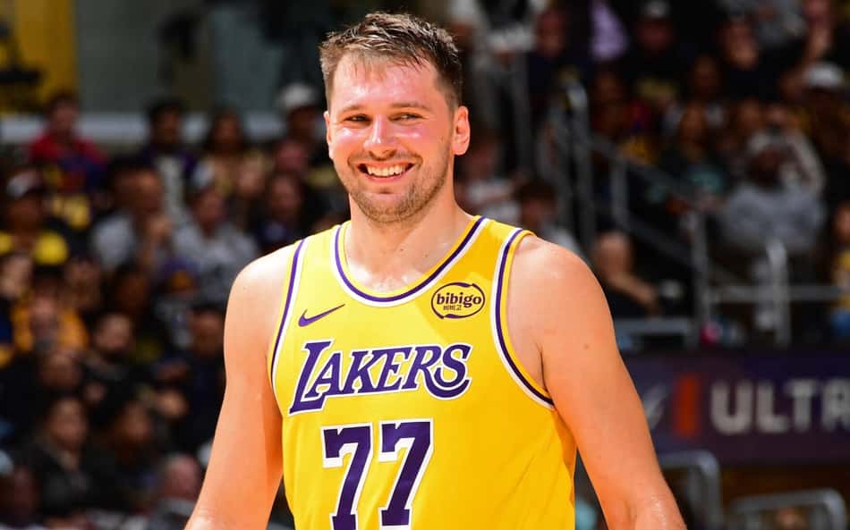 LOS ANGELES, CA - OCTOBER 21: Luka Doncic #77 of the Los Angeles Lakers smiles against the Golden State Warriors on October 21, 2025 at Crypto.Com Arena in Los Angeles, California. NOTE TO USER: User expressly acknowledges and agrees that, by downloading and/or using this Photograph, user is consenting to the terms and conditions of the Getty Images License Agreement. Mandatory Copyright Notice: Copyright 2025 NBAE Adam Pantozzi/NBAE via Getty Images/AFP (Photo by Adam Pantozzi / NBAE / Getty Images / Getty Images via AFP)