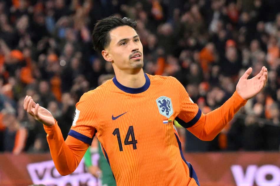 Reijnders comemorando o gol da Holanda (Foto: John Thys/AFP)