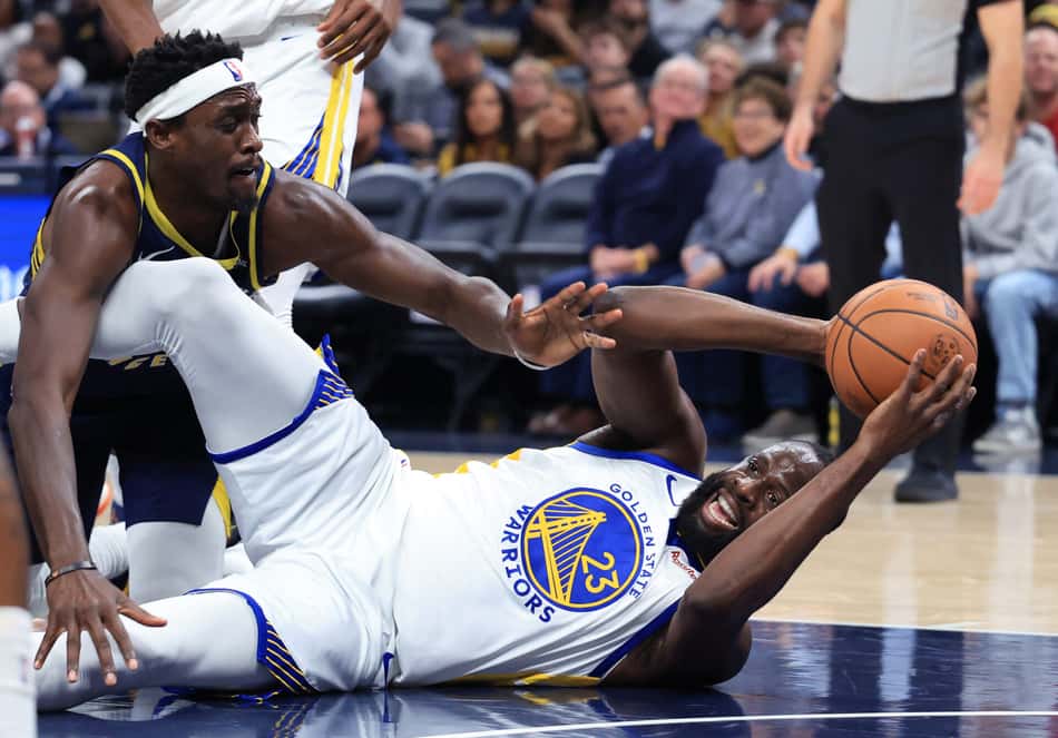 Draymond Green em jogo entre Golden State Warriors e Phoenix Suns na NBA (Foto: Justin Casterline/Getty Images/AFP)