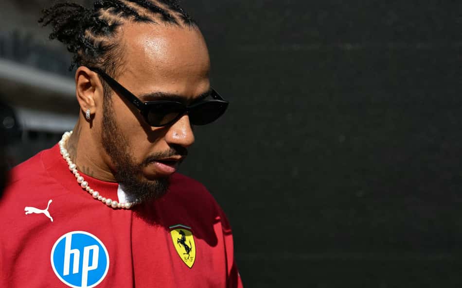 Ferrari's British driver Lewis Hamilton arrives for the practice session for the United States Formula One Grand Prix at the Circuit of the Americas in Austin, Texas, on October 17, 2025. (Photo by Jim WATSON / AFP)