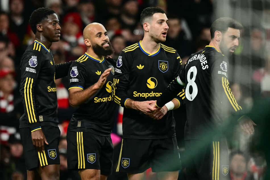 Jogadores do Manchester United comemoram gol sobre o Arsenal, pela Premier League (Foto: Ben STANSALL / AFP)
