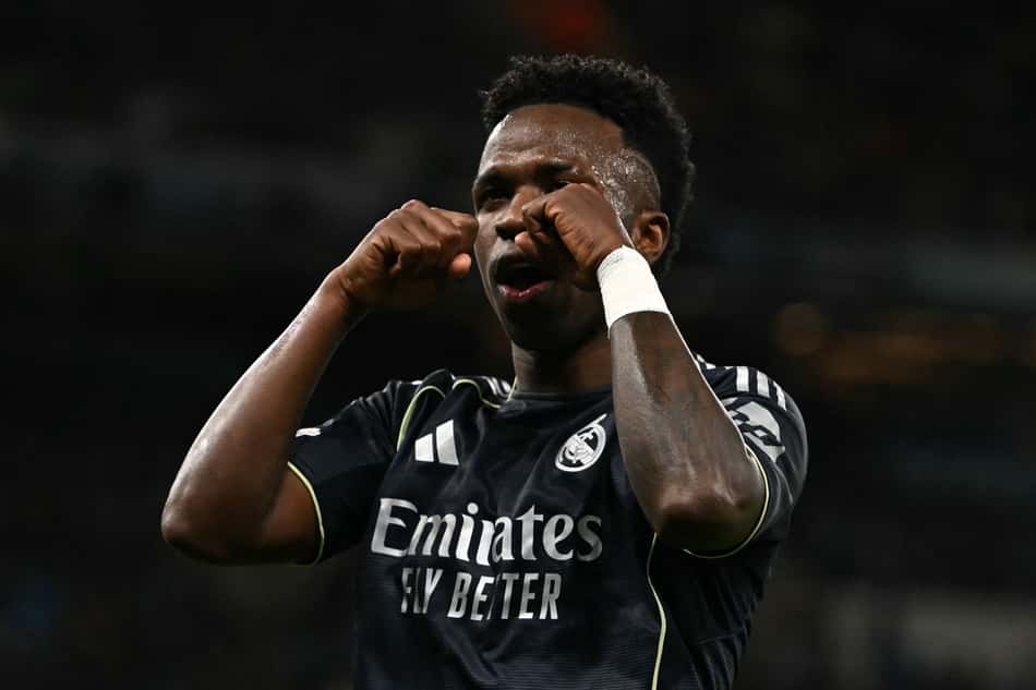 Vini Jr comemorando o gol marcado no duelo entre Real Madrid e Man City (Foto: Paul Ellis/AFP)