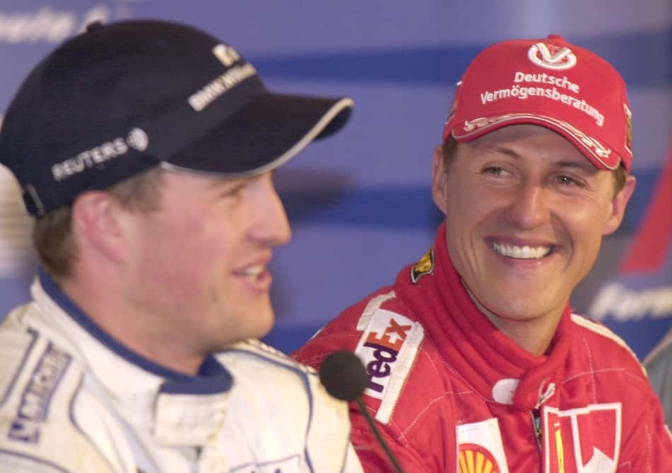 Michael e Ralf Schumacher em pódio no GP do Canadá pela F1 2001 (Foto: Reprodução/X/F1)