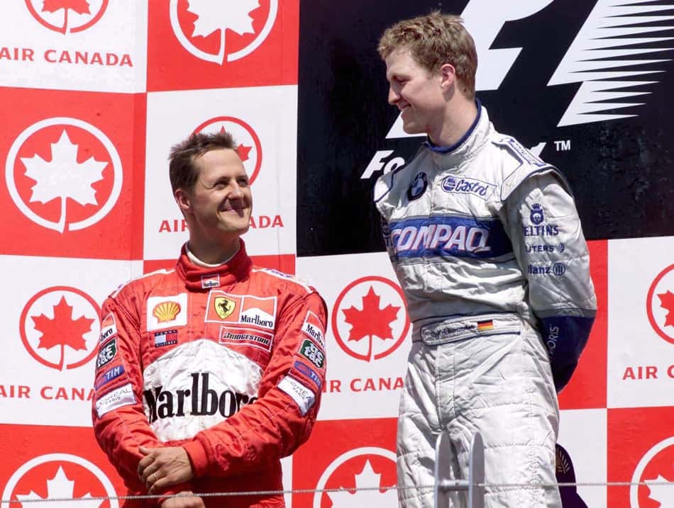 Michael e Ralf Schumacher em pódio no GP do Canadá pela F1 2001 (Foto: Reprodução/X/F1)
