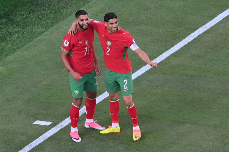 smael Saibari comemora o primeiro gol de sua equipe com chraf Hakimi, durante a partida de futebol do Grupo C da Copa do Mundo de 2026 entre Brasil e Marrocos, no Estádio Nova York/Nova Jersey (Foto: Angela WEISS / AFP)
