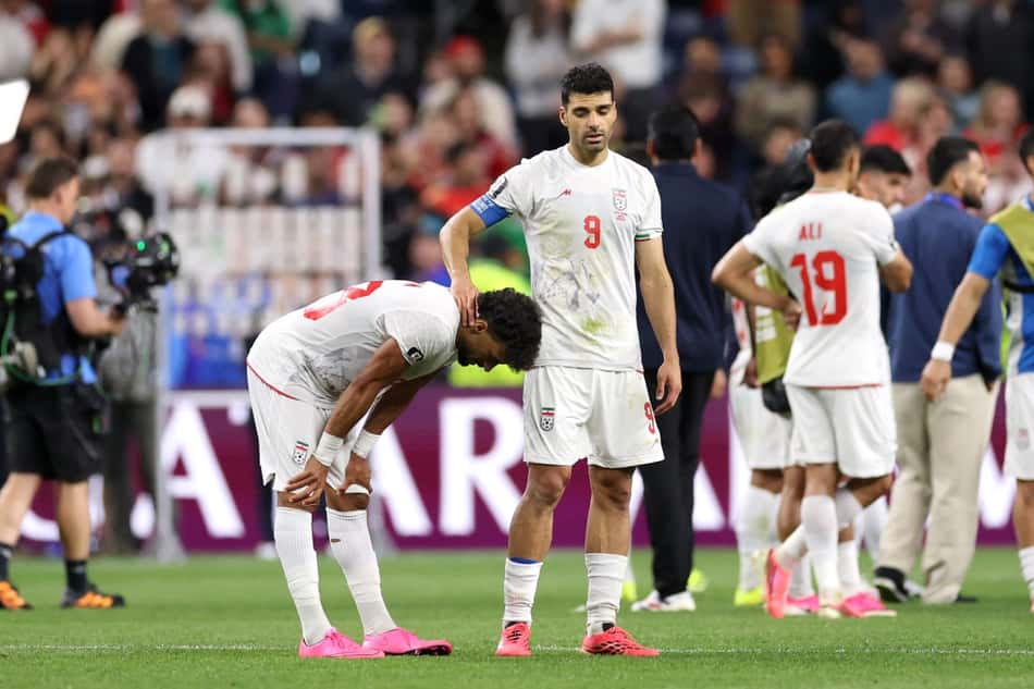Jogadores do Irã (Richard HEATHCOTE / GETTY IMAGES NORTH AMERICA / Getty Images via AFP))