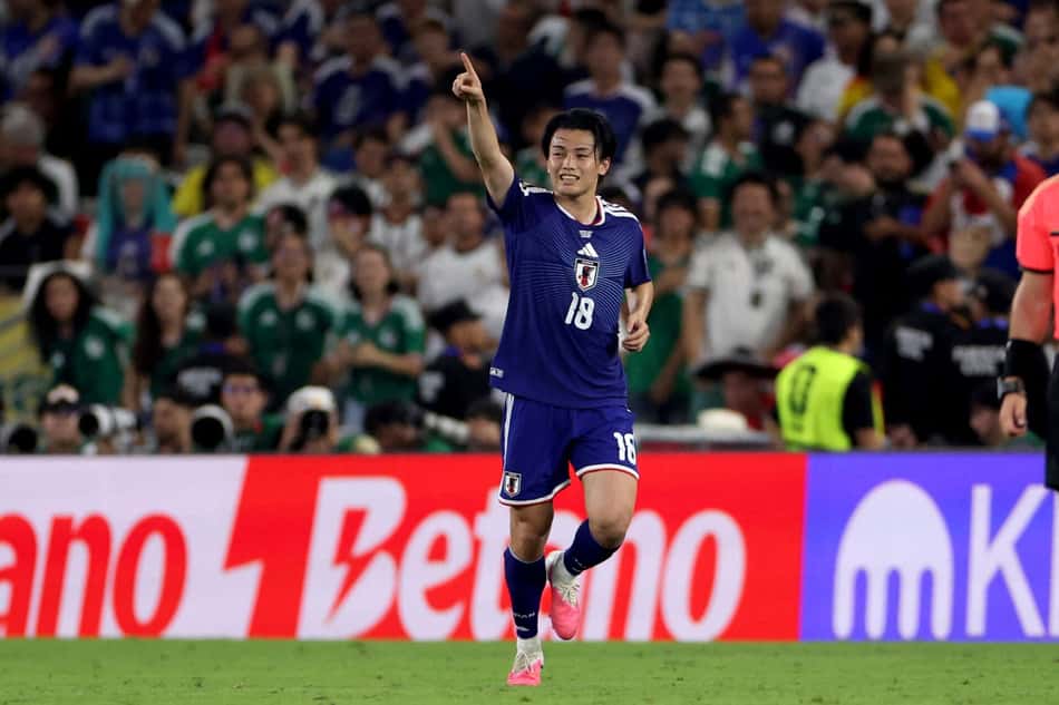 No jogo mil da história das Copas do Mundo, o Japão venceu a Tunísia por 4 a 0 (Foto: Julio Cesar AGUILAR / AFP)