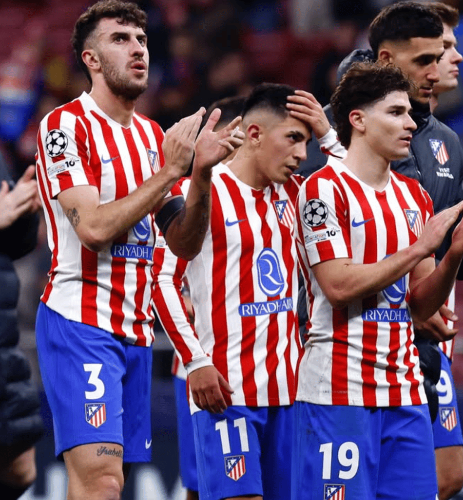 Rugerri com companheiros do Atlético de Madrid