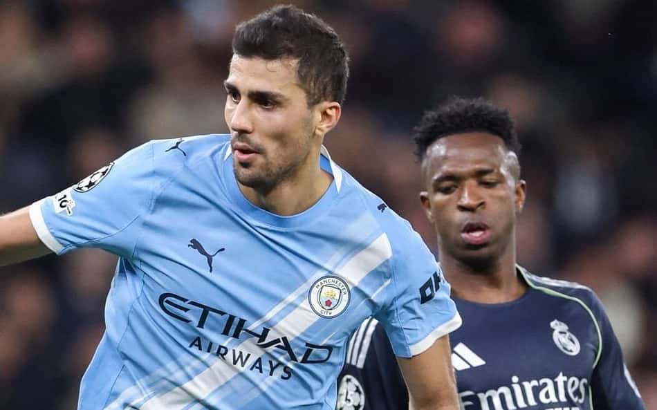 Rodri e Vini Jr em ação no duelo entre Real Madrid x Manchester City (Foto: Reprodução/X)