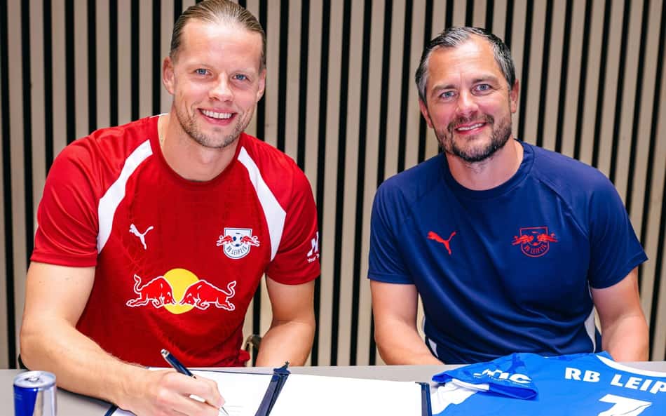 Nyland de camisa vermelha assina contrato