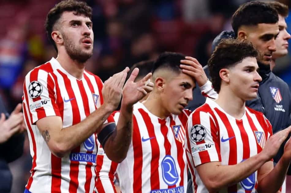 Rugerri com companheiros do Atlético de Madrid