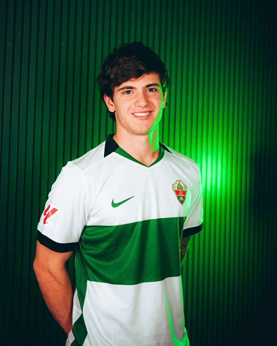 Tiziano Perrota sorrindo