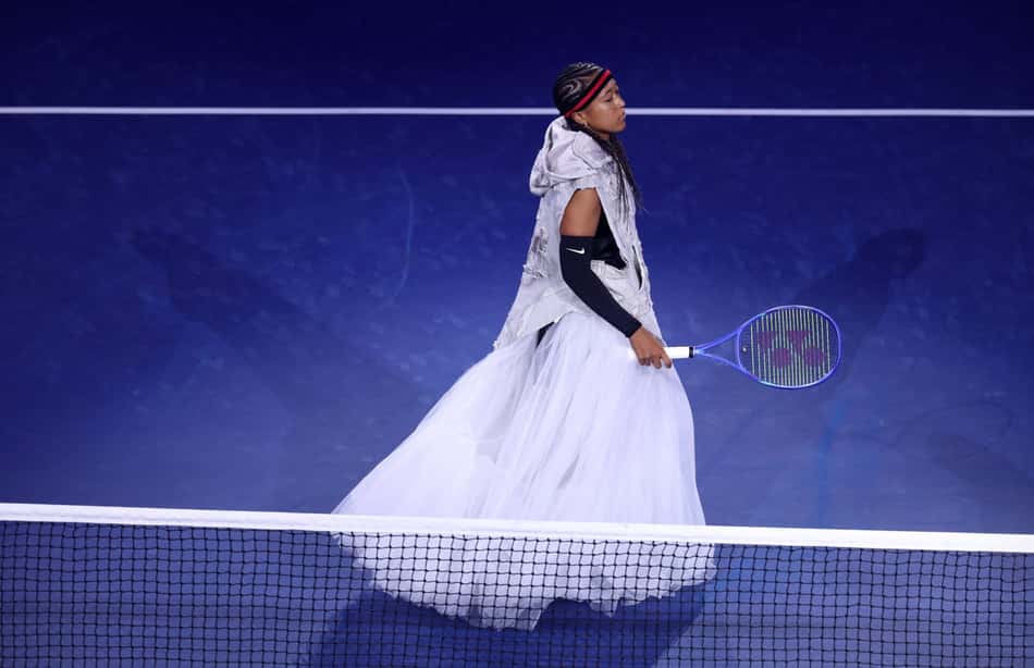 A japonesa Naomi Osaka entra na quadra para a partida da primeira rodada de simples feminino contra Anastasia Zakharova, no segundo dia do torneio de tênis US Open, no USTA Billie Jean King National Tennis Center, no bairro de Flushing, no distrito de Queens, em Nova York 