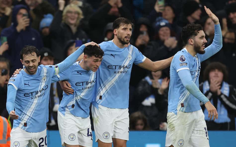 Jogadores do Manchester City comemrando o gol marcado pela Premier League (Foto: Darren Staples/AFP)