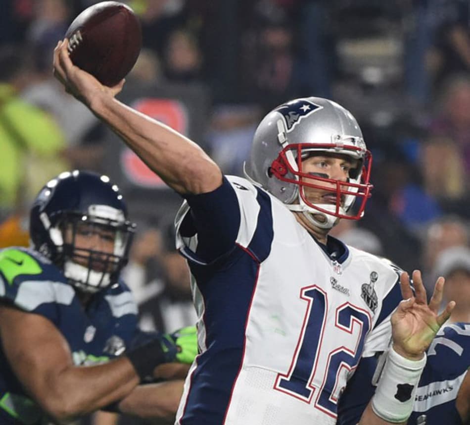 Destaque do jogo da final, Tom Brady prepara mais um lançamento (Foto: AFP)