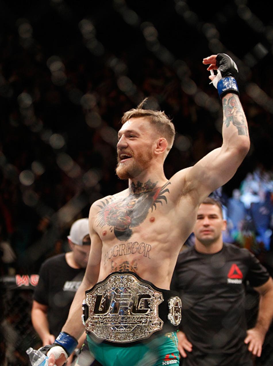 McGregor é apresentado na capa de novo game do UFC ao lado de Ronda