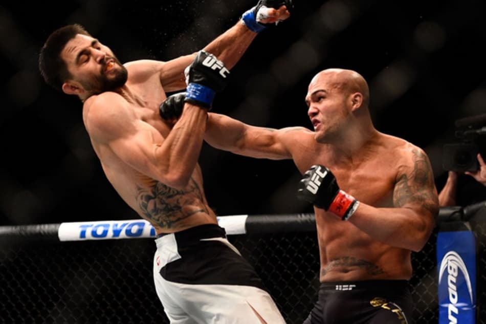 Aplaudidos de pé, Lawler derrota Condit e defende título em luta épica