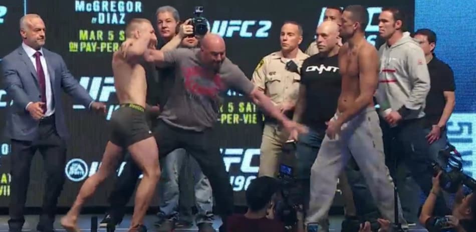 McGregor e Diaz trocam ofensas e são apartados por Dana em pesagem