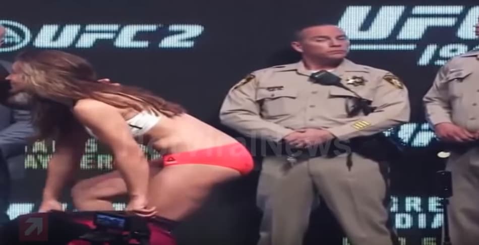 Miesha Tate é conferida por policial americano (FOTO: Reprodução)