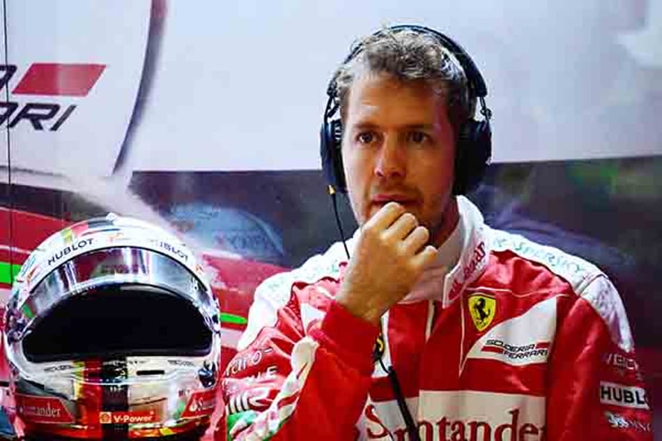 Vettel afirma que "sono" de Button lhe custou umas três posições no grid