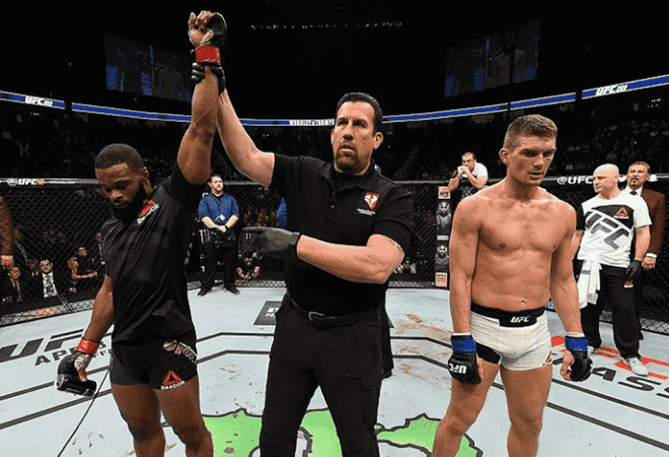 Em luta sem emoção, Woodley vence Thompson e mantém cinturão do UFC