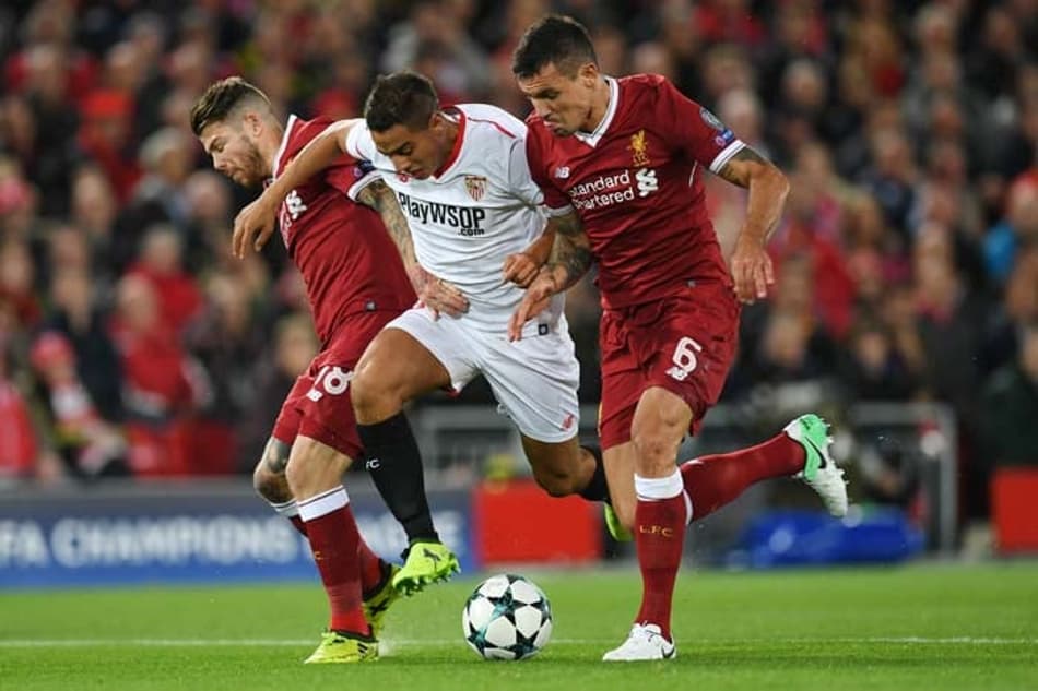 Sevilla larga na frente, mas Liverpool garante o empate em casa