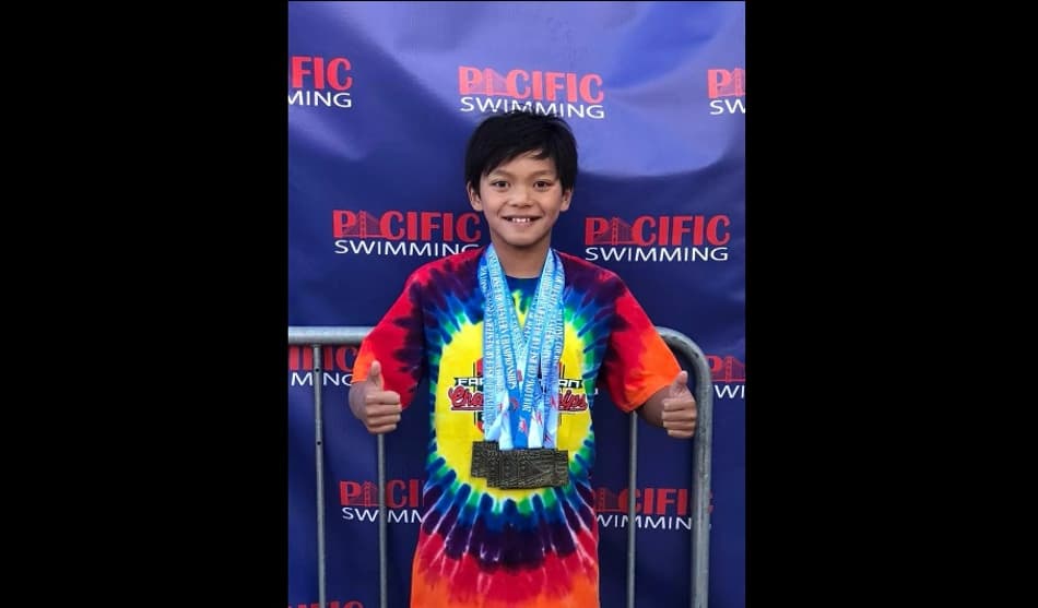Com 10 anos e nome de super-herói, menino bate recorde de Phelps
