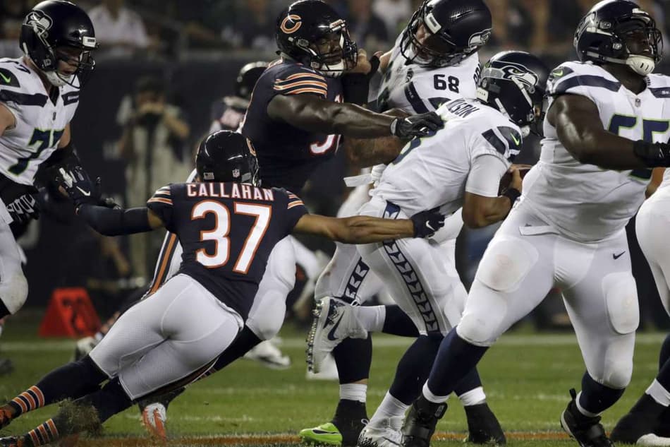 Russell Wilson continua correndo pela sua vida em Seattle