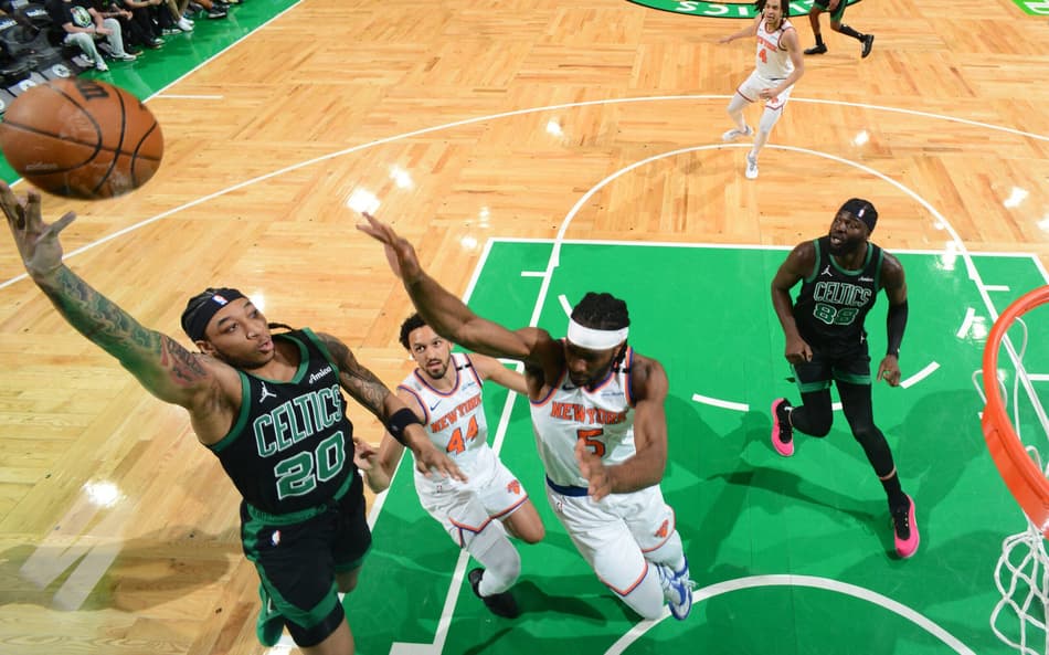 BOSTON, MA - MAY 14: JD Davison #20 of the Boston Celtics drives to the basket during the game against the New York Knicks during Round Two Game Five of the 2025 NBA Playoffs on May 14, 2025 at TD Garden in Boston, Massachusetts. NOTE TO USER: User expressly acknowledges and agrees that, by downloading and/or using this Photograph, user is consenting to the terms and conditions of the Getty Images License Agreement. Mandatory Copyright Notice: Copyright 2025 NBAE Brian Babineau/NBAE via Getty Images/AFP (Photo by Brian Babineau / NBAE / Getty Images / Getty Images via AFP)