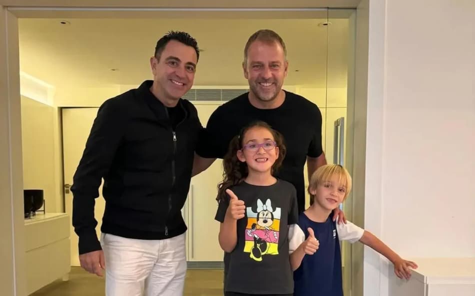 Xavi e Hansi Flick se encontrando