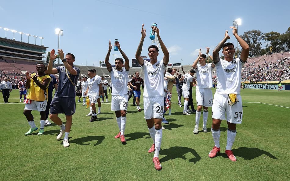 Time do Botafogo comemorando a classificçaão no Mundial (Foto: Vítor Silva/Botafogo)