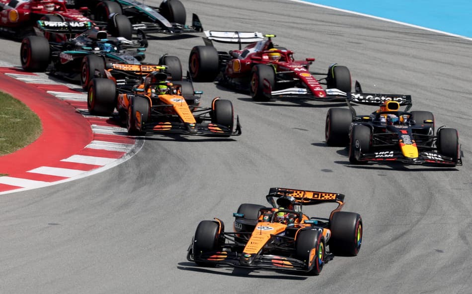 McLaren's Australian driver Oscar Piastri leads the race at the start of the Spanish Formula One Grand Prix at the Circuit de Catalunya in Montmelo, on the outskirts of Barcelona, on June 1, 2025. (Photo by Pierre-Philippe MARCOU / AFP)