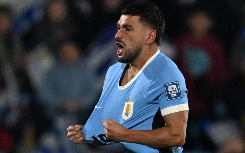 Arrascaeta comemora seu gol no jogo do Uruguai contra a Venezuela (Foto: Eitan ABRAMOVICH / AFP))
