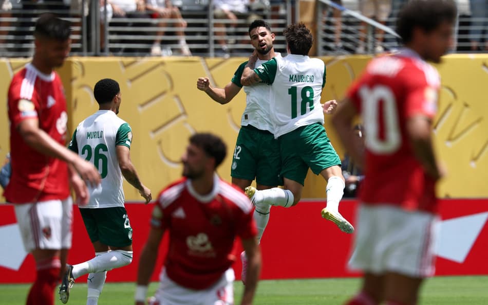 Palmeiras' Argentine forward #42 Jose Manuel Lopez celebrates with Palmeiras' Brazilian midfielder #18 Mauricio after Al-Ahly's own goal during the FIFA Club World Cup 2025 Group A football match between Brazil's Palmeiras and Egypt's Al-Ahly at the MetLife stadium in East Rutherford, New Jersey on June 19, 2025. (Photo by FRANCK FIFE / AFP)