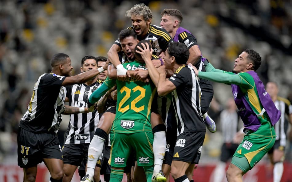 Jogadores do Atlético-MG comemoram classificação (Foto: DOUGLAS MAGNO / AFP)