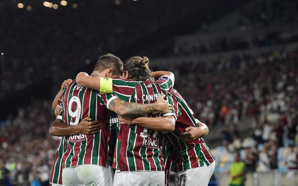Jogadores do Fluminense comemoram gol contra o América de Cali