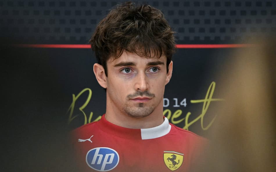 Charles Leclerc, da Ferrari, durante GP da Hungria na F1 2025 (Foto: Attila KISBENEDEK / AFP)
