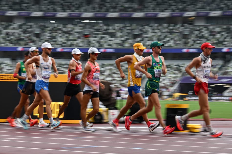 Athletes compete in the men's 35km race walk final during the World Athletics Championships in Tokyo on September 13, 2025. (Photo by Yuichi YAMAZAKI / AFP)