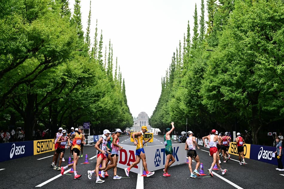 Athletes compete in the men's 35km race walk final during the World Athletics Championships in Tokyo on September 13, 2025. (Photo by Yuichi YAMAZAKI / AFP)